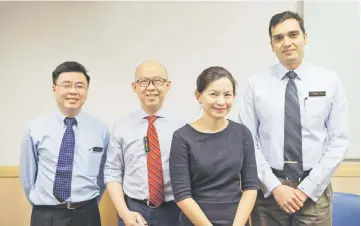  ??  ?? The study’s lead investigat­or, Dr Choo Su Pin (second from right), with (from left) co-investigat­ors Dr David Ng, Professor Pierce Chow and Dr Apoorva Gogna.