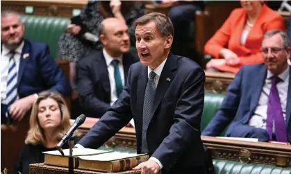  ?? Photograph: Jessica Taylor/UK Parliament/ AFP/Getty ?? Jeremy Hunt making his autumn budget statement in the House of Commons on Thursday.