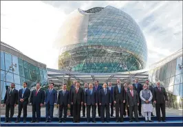  ?? MIKHAIL METZEL / SPUTNIK ?? World leaders, including Russian President Vladimir
Putin (center) attend the opening ceremony of the Astana Expo 2017 exhibition in Astana, Kazakstan, in June. Minnesota is hoping to host the first expo on U.S. soil in nearly 40 years.