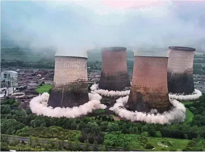  ??  ?? Above and below: the dramatic demolition seen from the air (Dave Edwards/swns)