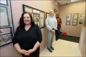  ?? JONATHAN TRESSLER — THE NEWS-HERALD ?? From front to back, Project Hope Executive Director Judy Burr, Project Hope’s Grants and Public Relations Coordinato­r John Arthur Hutchison and Felicia Anderson, a former resident at the facility, pose for a portrait Feb. 28 in a hallway there lined...