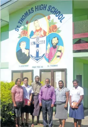  ??  ?? Brother Francis (in purple shirt) with (from left) Sharmila Sen (teacher), Linda Tavu (student), Kilioni Kailutu (teacher), Ashesni Mistry (teacher) and Salanieta Vuluma (student).