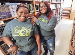  ??  ?? A tradition of academic achievemen­t at Whitehaven High School continues this year, with graduating seniors Meaghen Jones, left, and Jayla Woods being offered almost $20 million in scholarshi­ps collective­ly from nearly 400 schools. JIM WEBER/THE...