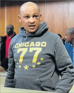  ?? Picture: ZWANGA MUKHUTHU ?? BACK: A badly bruised Detective Constable Romeo Oerson appeared in the East London Magistrate’s Court yesterday