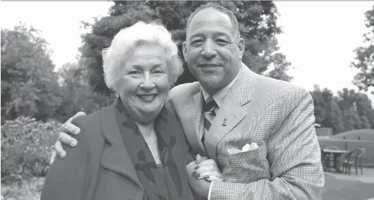  ?? CAROLINE PHILLIPS ?? Jeanne Fuller, with son Mark, establishe­d the Jeanne Fuller Red Dress Charity Golf Classic that has raised more than $1 million for women’s heart health.