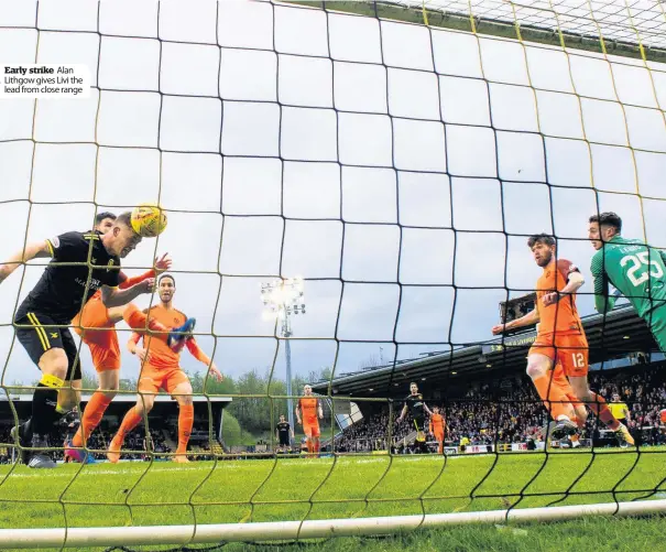  ??  ?? Early strike Alan Lithgow gives Livi the lead from close range