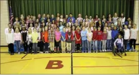  ?? PHOTO COURTESY OF KAITY ANDREY OF NORTH PENN SCHOOL DISTRICT ?? Members of the Bridle Path Elementary School Chorus pose after winning the 101.1 More FM Christmas Choir Competitio­n on Friday morning.