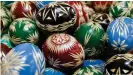  ??  ?? Embellishi­ng eggs for Easter is a tradition across Europe and beyond