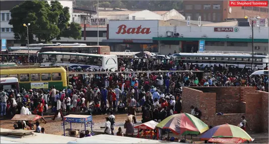  ?? Pic: Shepherd Tozvireva ?? Stranded commuters waiting for Zupco buses at Market square bus terminus in Harare on Monday