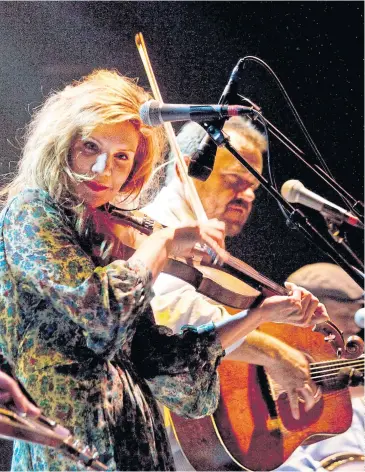  ??  ?? NO STRINGS ATTACHED: Alison Krauss brings pop-inflected bluegrass to ‘Windy City’, a new album of lushly orchestrat­ed country covers.