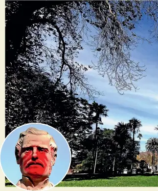  ?? Main: RICKY WILSON/STUFF ?? A statue of Sir George Grey in Auckland’s Albert Park was vandalised yesterday. The statue’s face, bust and hands had been covered with red paint, and text was visible on the structure.