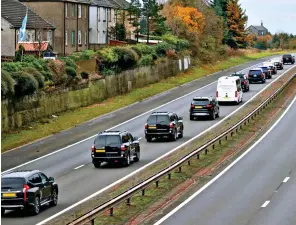  ?? ?? Procession: Mr Biden’s team on the M8 after leaving Edinburgh...