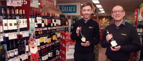  ??  ?? O’ CALLAGHAN’S CENTRA: Off licence manager, Edward Murphy with the proprietor, Albert O’ Callaghan.