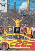  ?? BRADY KLAIN/THE REPUBLIC ?? NASCAR Cup Series driver Joey Logano celebrates in victory lane after winning the FanShield 500 on March 8 at Phoenix Raceway in Avondale.