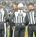  ??  ?? A far too common sight: Officials have become the stars of the NFL.