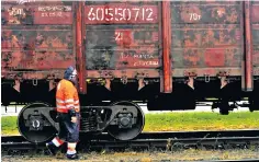  ?? ?? A freight train from Kaliningra­d is checked at the border station in Kybartai, Lithuania