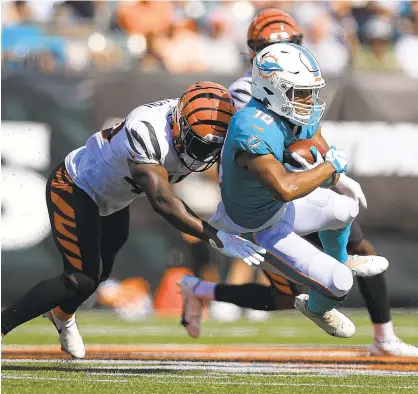  ?? AARON DOSTER/AP ?? Former Navy quarterbac­k Malcolm Perry, who spent last season with the Miami Dolphins and was on injured reserve with the New England Patriots this season, was signed by the New Orleans Saints on Tuesday.