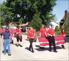  ?? MACOMB DAILY FILE PHOTO ?? Roseville school bands proceed down Common Road in a past Memorial Day Parade. The city has decided to cancel this year’s event.