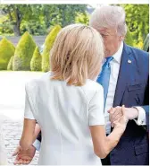  ??  ?? US-Präsident Donald Trump sagte in Paris zu Frankreich­s First Lady Brigitte Macron: „You're in such good shape“(„Sie sind so gut in Form“) – für die einen ein harmloses Kompliment, andere orten Sexismus