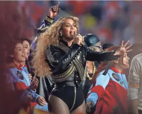  ?? GETTY IMAGES ?? Despite Coldplay (not pictured) headlining the Super Bowl halftime show in February, Beyoncé rules with a commanding performanc­e of her new song, “Formation.”