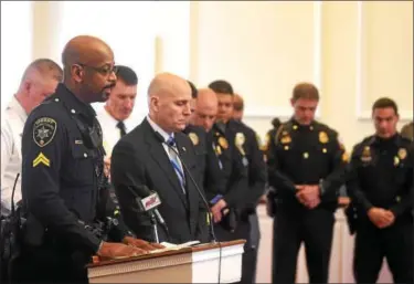  ?? PETE BANNAN – DIGITAL FIRST MEDIA ?? Chester County Sheriff’s Cpl. Wayne Johnson sing “Amazing Grace” as a memorial to fallen officers to end the Chester County District Attorney Awards ceremony at the Historic Chester County Courthouse.