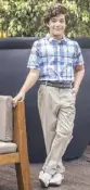  ??  ?? J by Jasper Conran checked shirt and beige chinos.