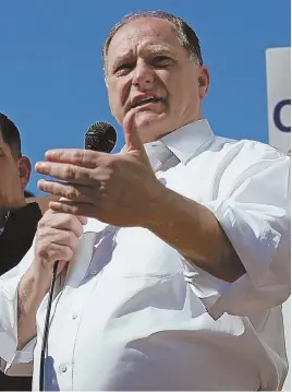  ?? STAFF FILE PHOTO, ABOVE, BY ANGELA ROWLINGS, LEFT, BY STUART CAHILL ?? WRONG FOCUS: U.S. Rep. Michael E. Capuano, above, yesterday denied reports he wants to eliminate ICE. His primary opponent, Ayanna Pressley, above left, has called for defunding the agency.