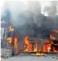  ?? PTI ?? Fire engulfs a premier garment showroom located at Palamandap near Badambadi in Cuttack on Sunday. —