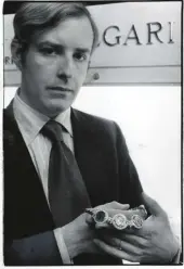  ?? ?? Mr. Nicola Bulgari inside the Bulgari store at Hotel Pierre showing a necklace with coins, 1975.