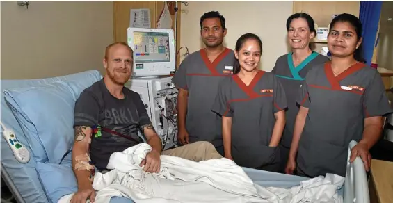  ?? PHOTO: BEV LACEY ?? WALK FOR CAUSE: Receiving his dialysis treatment at the Toowoomba Dialysis Clinic at St Andrew’s Hospital is Aaron Williams with (from left) nurses Suman Prasai, Remile dela Pena, health care assistant Susan Deeth and nurse Ligi Babu.