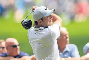  ?? Pictures: Getty. ?? Top: Alex Noren with the BMW PGA title – his fifth win in 17 events since winning the Scottish Open last year; above: Francesco Molinari finished two shots behind the Swede thanks to a closing round 68.