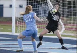  ?? JOHN BLAINE — FOR THE TRENTONIAN ?? Hightstown goalkeeper Courtney Fox (00) saves a shot by Notre Dame’s Mikayla Beetel (20) during Wednesday afternoon’s game.