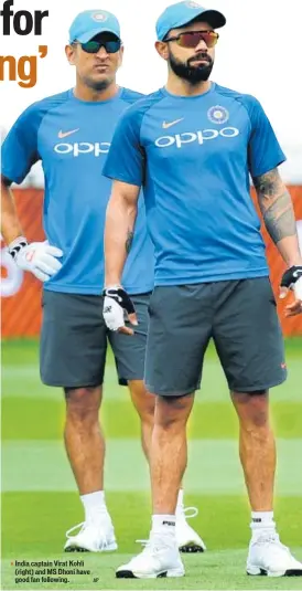  ?? AP ?? India captain Virat Kohli (right) and MS Dhoni have good fan following.