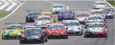  ??  ?? A file photo of cars competing during the 2016-17 Porsche GT3 Cup Challenge Middle East series at the Sakhir Internatio­nal F1 circuit in Bahrain