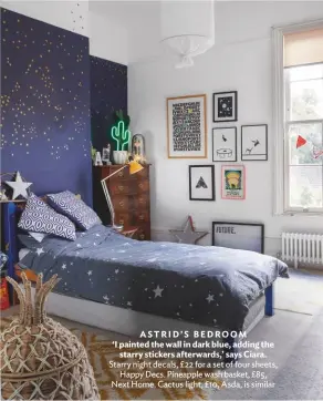  ??  ?? ASTRID’S BEDROOM ‘I painted the wall in dark blue, adding the starry stickers afterwards,’ says Ciara. Starry night decals, £22 for a set of four sheets, Happy Decs. Pineapple wash basket, £85, Next Home. Cactus light, £10, Asda, is similar