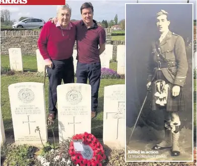  ??  ?? Poignant moment Malcolm and son Iain at the grave of 2nd Lt Walker Killed in action Lt Malcolm Reid Walker