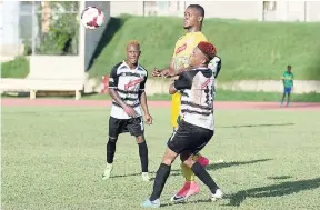  ??  ?? Cavalier’s Chevon Marsh (left) and teammate Alex Marshall (right) are considered two of Cavalier’s and Jamaica’s top young footballin­g prospects.