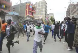  ??  ?? NAIROBI: Residents of the Mathare area of Nairobi, Kenya, take to the streets by blocking roads with burning tires to protest in support of Kenyan opposition leader and presidenti­al candidate Raila Odinga. —AP