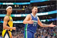  ?? (AP photo/Sam Hodde) ?? Dallas Mavericks guard Luka Doncic (77) reacts to a foul call Tuesday during a basketball game against the Indiana Pacers in Dallas.