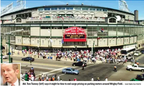  ?? | SUN- TIMES FILE PHOTO ?? Ald. TomTunney ( left) says it might be time to end surge pricing on parking meters aroundWrig­ley Field.