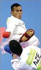  ?? PATRICK BAZ/AFP SERVICES ?? TUNGGU KEPASTIAN: Karateka Indonesia Suryadi saat bertanding di Islamic Solidarity Games (ISG) 2017 di Baku, Azerbaijan.