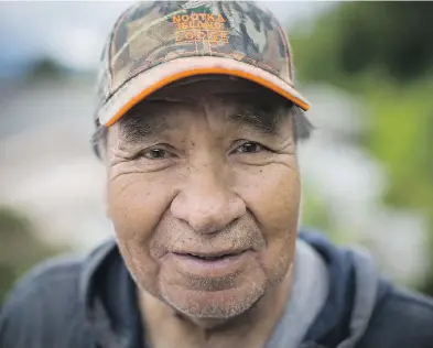  ??  ?? Ray Williams of the Mowachaht First Nation, above, holds a fishing spear made of Elk antler that could be 400 years.