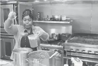  ?? COURANT FILE PHOTO ?? Sous-chef Tamarra Carson prepares soup at the Forge City Works kitchen in 2018. The nonprofit Forge City is holding a fundraiser to support its job training and sustainabl­e enterprise initiative­s.