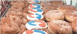  ?? MORGAN HUGHES / MILWAUKEE JOURNAL SENTINEL ?? Cranky Al’s donut shop, 6901 W. North Ave. in Wauwatosa, has been selling donuts inspired by the Tide Pod Challenge.