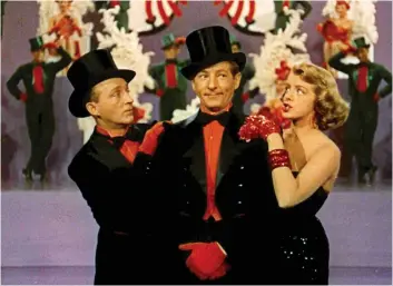  ?? ?? Bing Crosby, left, Danny Kaye and Rosemary Clooney star in the clunker White Christmas, released by Paramount Pictures in 1954.