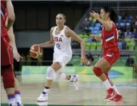  ?? CARLOS OSORIO — THE ASSOCIATED PRESS FILE ?? United States guard Diana Taurasi dribbles during a game against Serbia at the 2016 Summer Olympics in Rio de Janeiro, The four-time Olympic gold medalist is back for one more run at a world championsh­ip and potentiall­y the 2020 Tokyo Olympics if she...