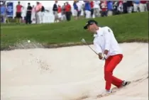  ?? GRAHAM PAINE/METROLAND ?? Canada’s Graham DeLaet, of Weyburn, Sask., blasts his way out of the bunker on 18 and onto the green during Red & White Day at Glen Abbey.