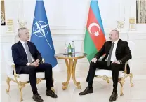  ?? AZERBAIJAN­I PRESIDENCY PHOTO VIA AFP ?? QUICK CHAT
Azerbaijan’s President Ilham Aliyev (left) talks with North Atlantic Treaty Organizati­on Secretary-General Jens Stoltenber­g in the capital Baku on Sunday, March 17, 2024.