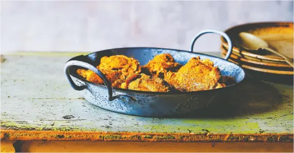  ?? KIM LIGHTBODY ?? Asma Khan, who released her debut cookbook earlier this year, says this traditiona­l, spice-infused chicken dish is a homage to her Muslim heritage.