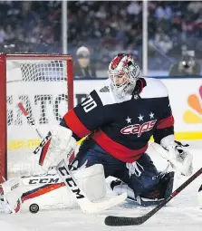  ?? NICK WASS/THE ASSOCIATED PRESS ?? Washington’s Braden Holtby makes a stop during the Capitals’ win Saturday over Toronto in Annapolis, Md.